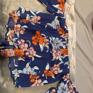 Blue top with orange and coral flowers
